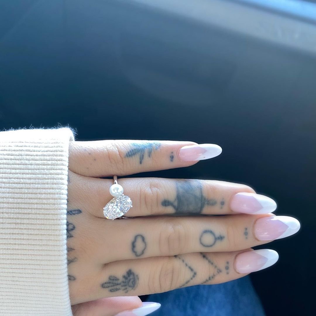 Everything turns out after Ariana Grande, the pop star posted a series of photos assuming their engagement on Instagram on Sunday.